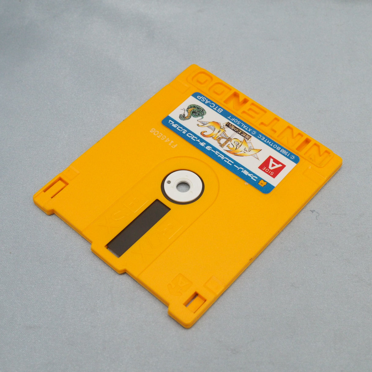 Three viewpoints in one Famicom Disk System game: overhead map, first-person dungeons, side-view battles. Aspic (1988) is a J — photo 3