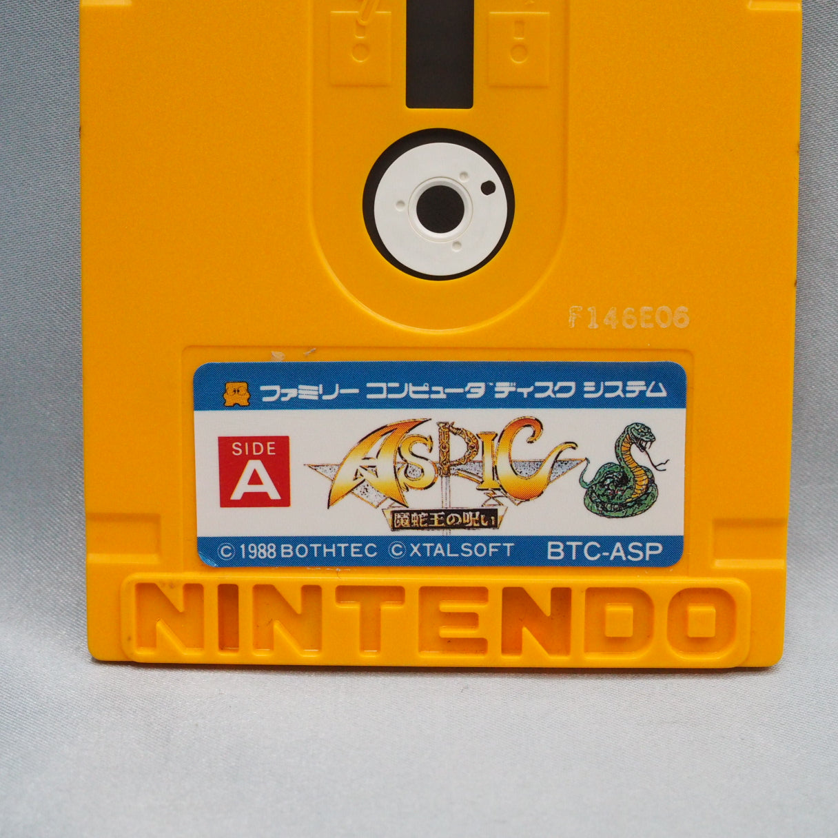 Three viewpoints in one Famicom Disk System game: overhead map, first-person dungeons, side-view battles. Aspic (1988) is a J — photo 5