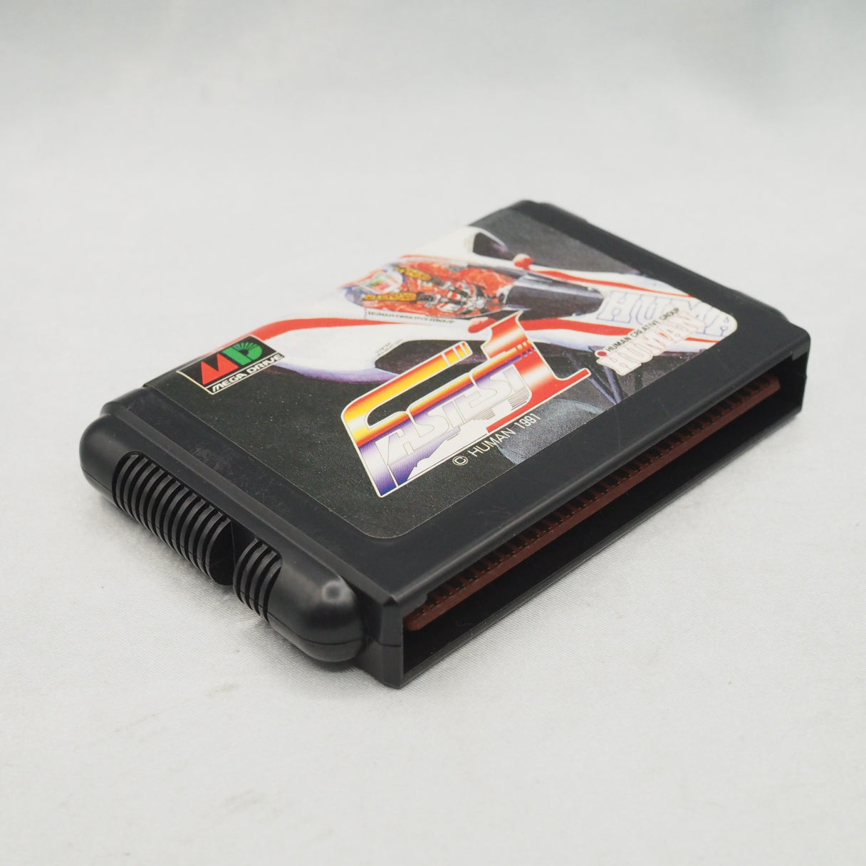 16 real F1 circuits, simulation handling, 1991 Mega Drive. Human Entertainment's Fastest 1 demanded real cornering discipline — photo 4