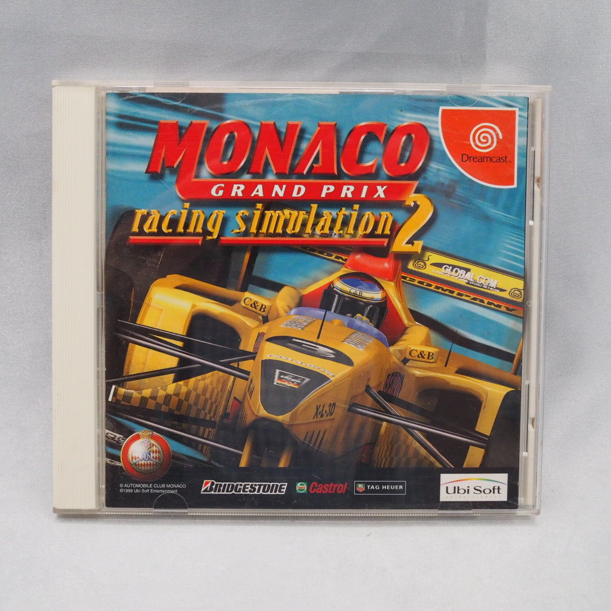 Ubisoft licensed the Monaco circuit but not the drivers — so the 1999 grid runs under fictional names. Dreamcast F1 sim, Japa — photo 9