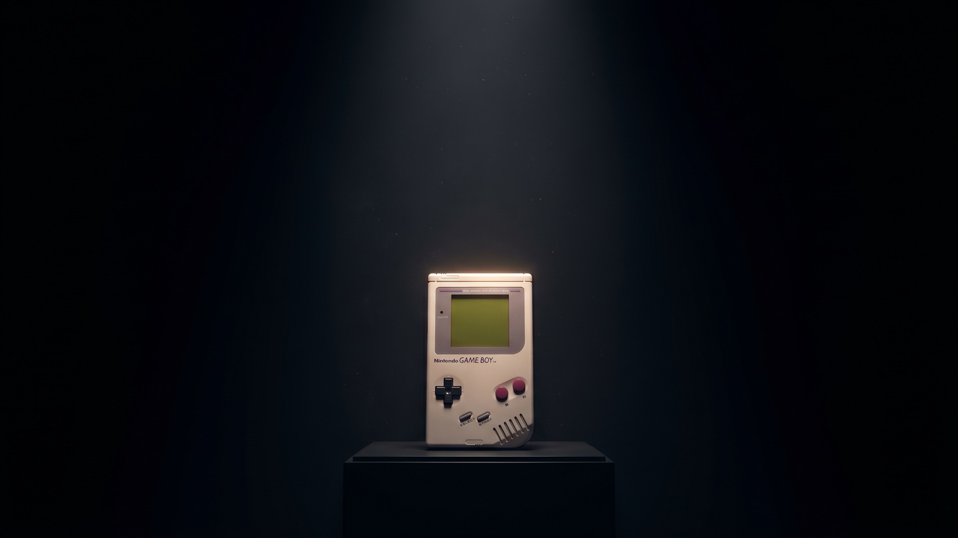 Nintendo Game Boy DMG-01 displayed on a museum pedestal under a single spotlight in darkness — The Exhibit in the Dark